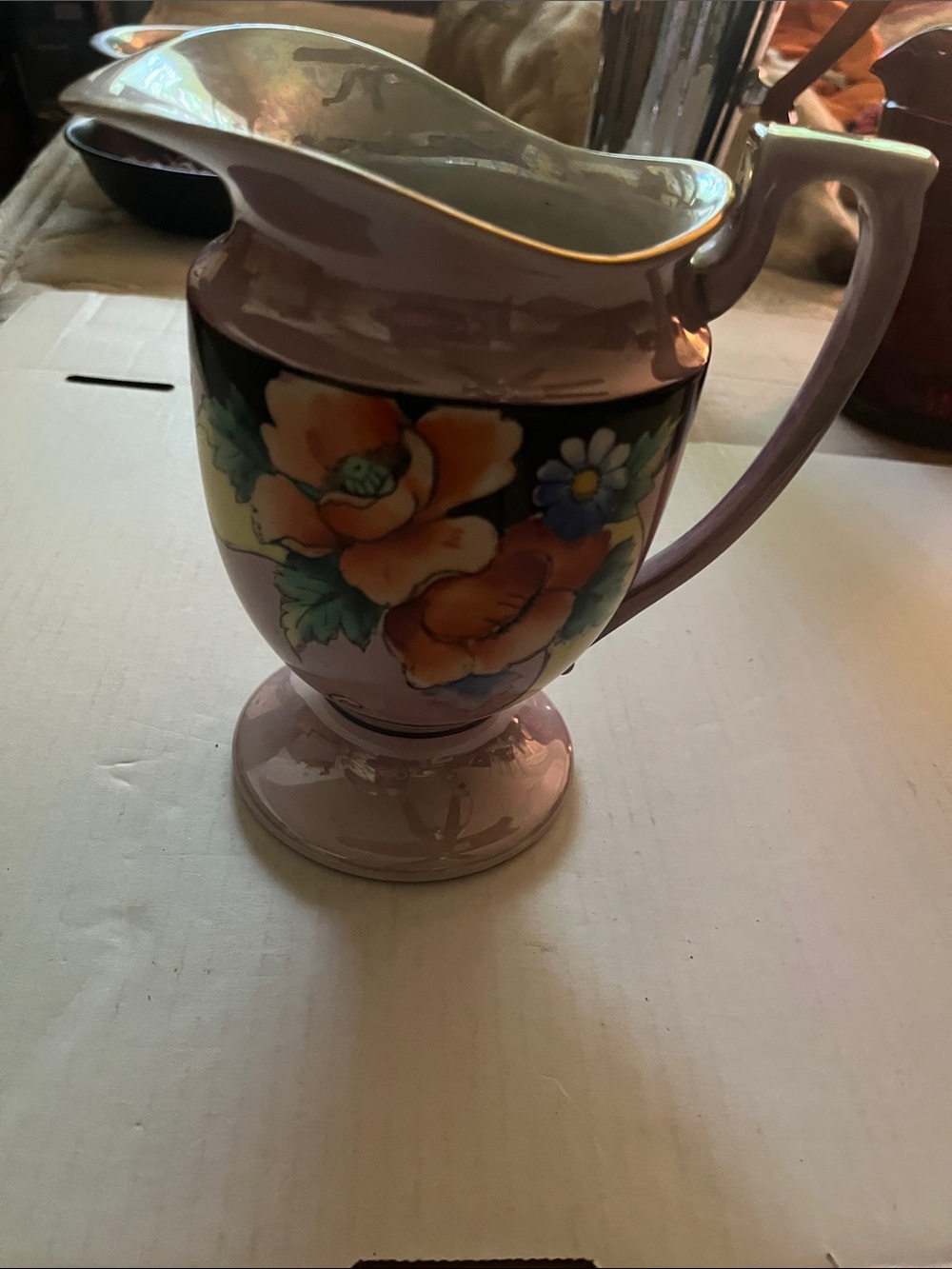 Pink Floral Ceramic Pitcher with Gold Trim
Japan Circa 1950 7 1/4 inch